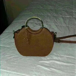 Chic Brown Leather Handbag with Gold Accents